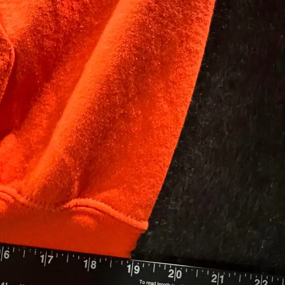 Justice orange hoodie with multicoloured design Size L